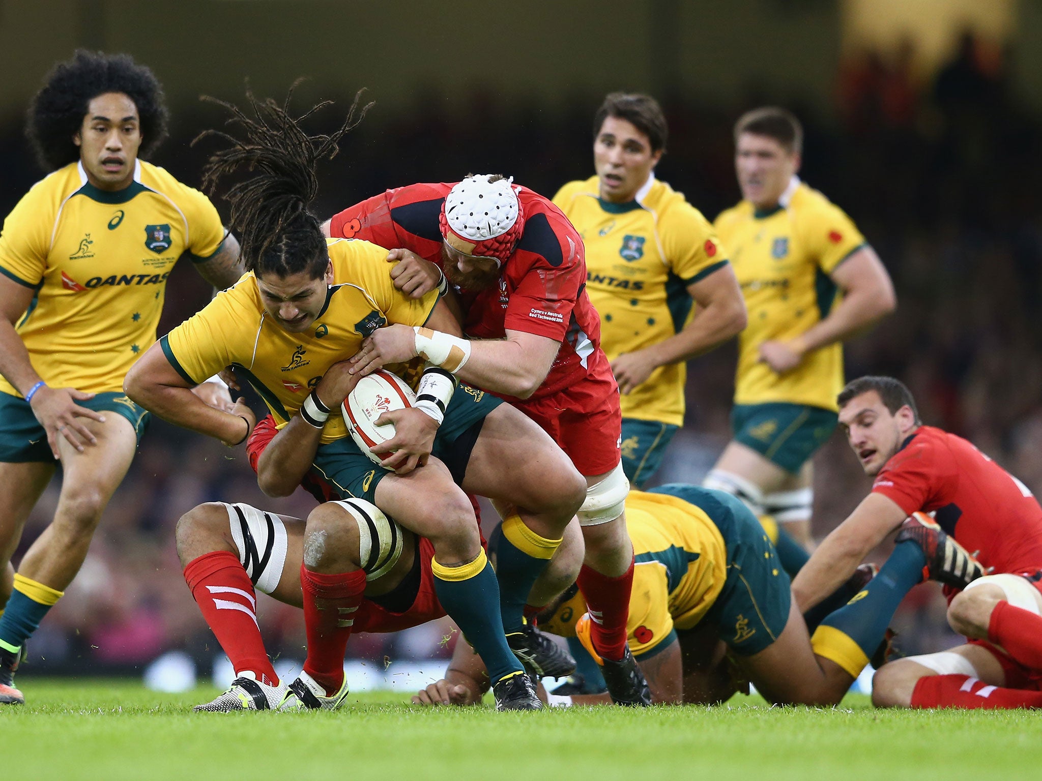 Wales second-row Jake Ball tackles Australian hooker Saia Fainga'a