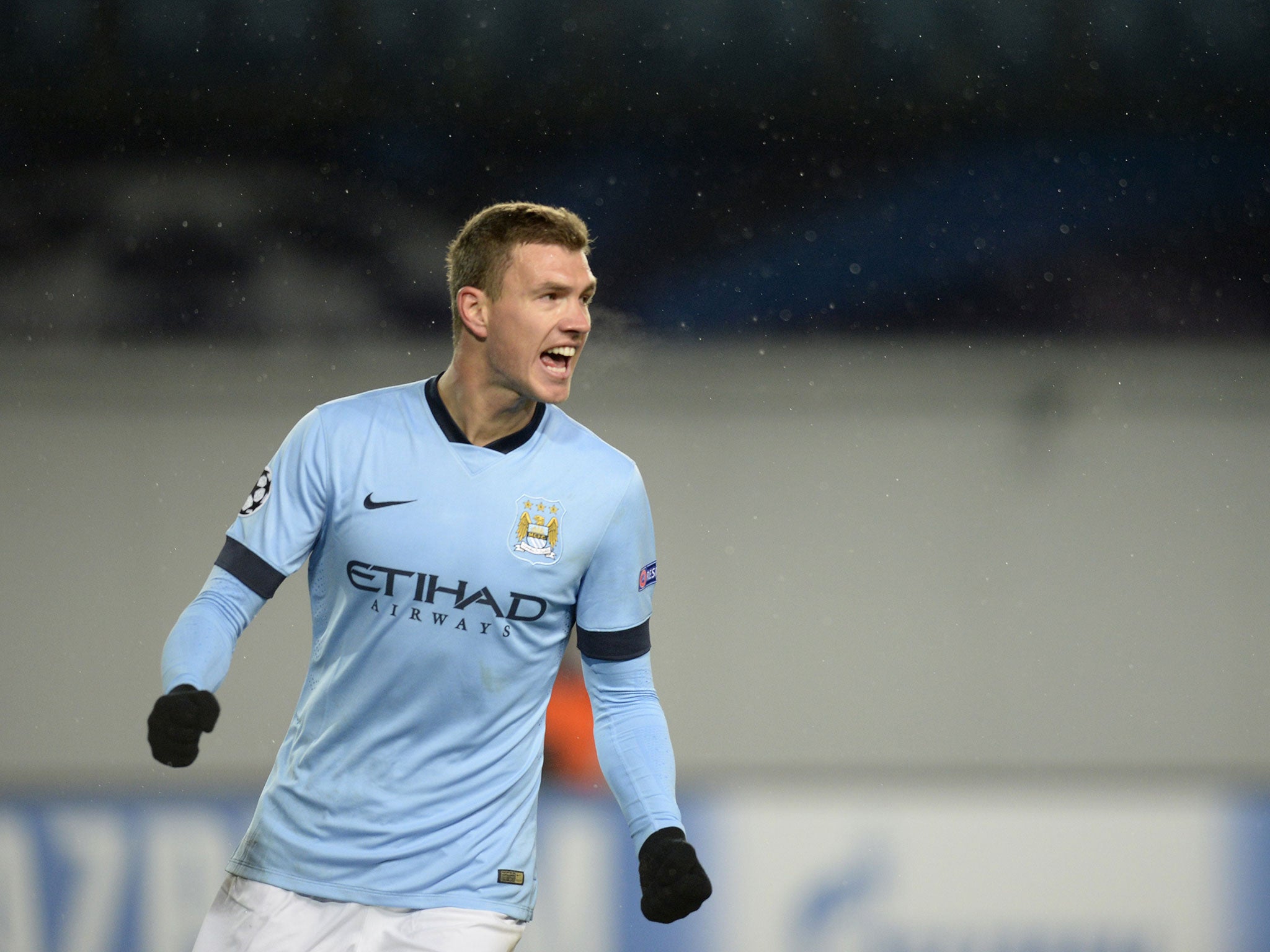 Edin Dzeko will miss three weeks with a calf injury