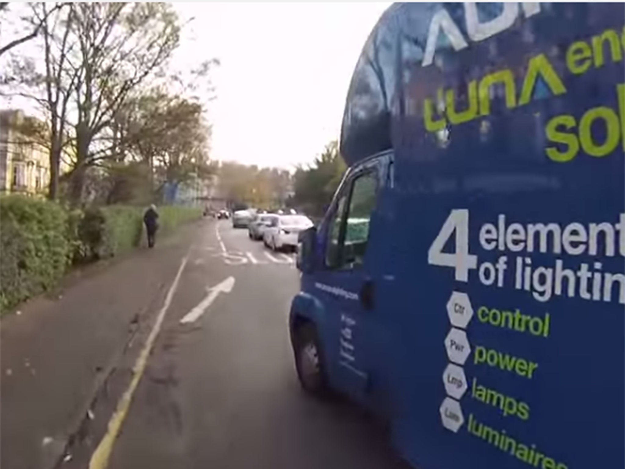 The video shows the driver of an Aurora Lighting van using a cycling lane to avoid traffic.