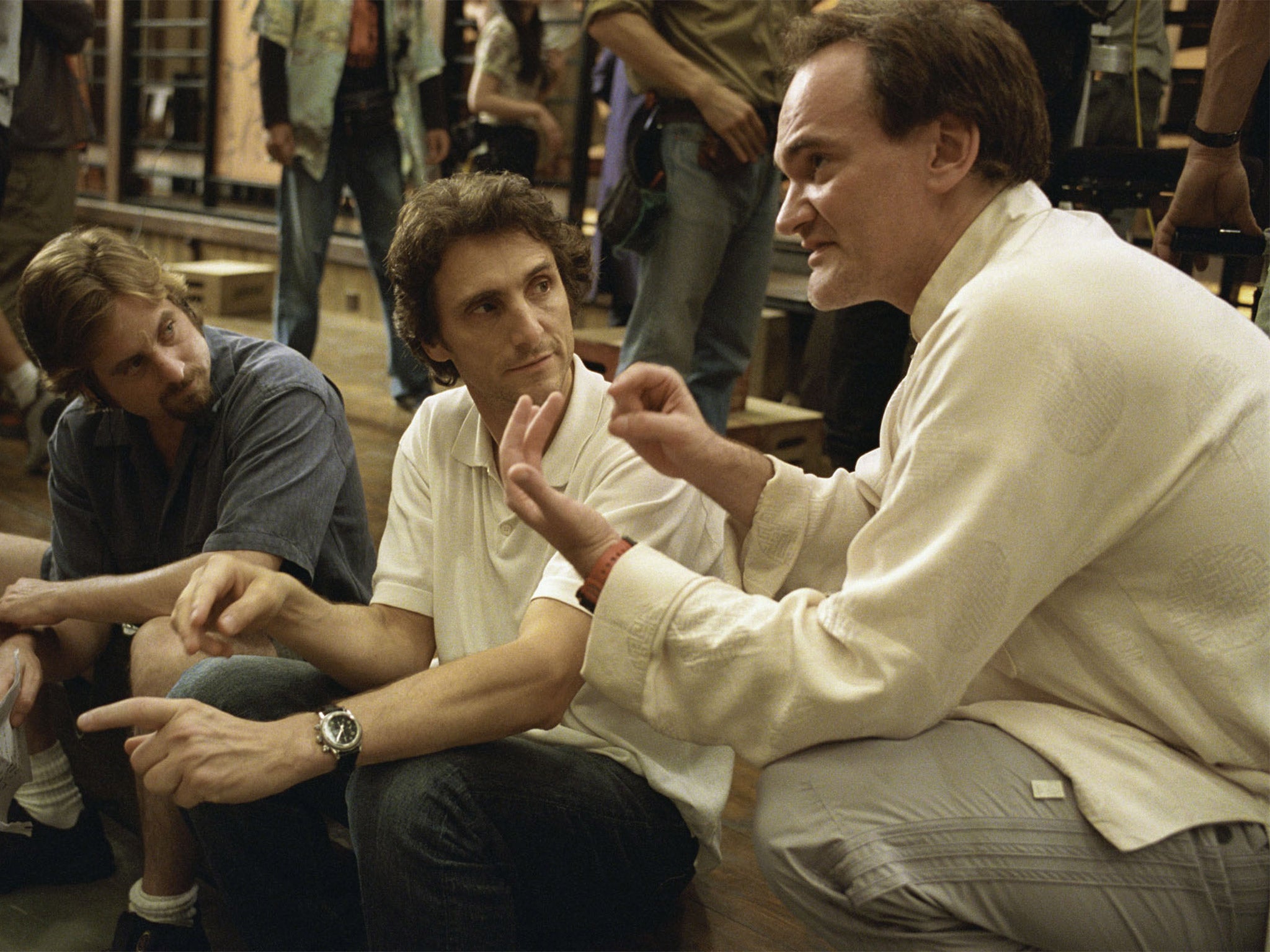 Quentin Tarantino, right, talking to his producer and first assistant director on the set of ‘Kill Bill’