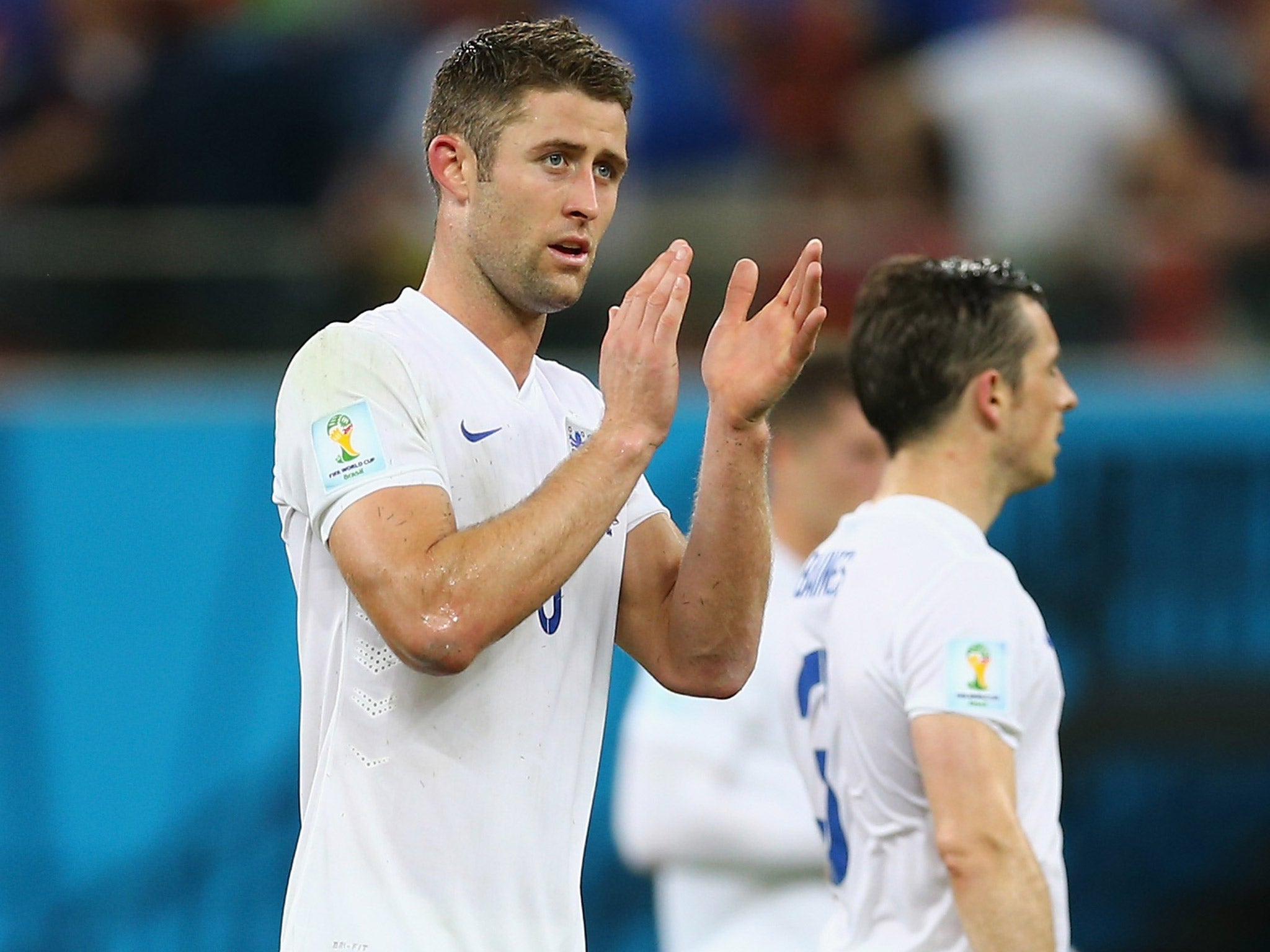 Gary Cahill applauds the fans following England's World Cup defeat to Italy