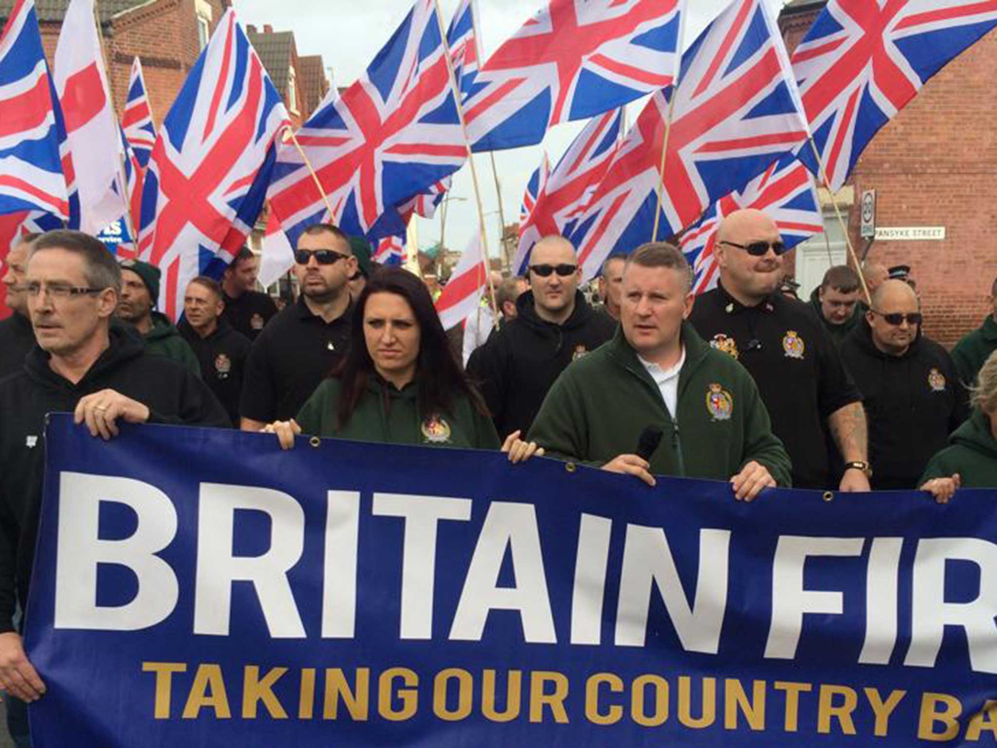 Britain First marching at a rally - leader Paul Golding can be seen at front
