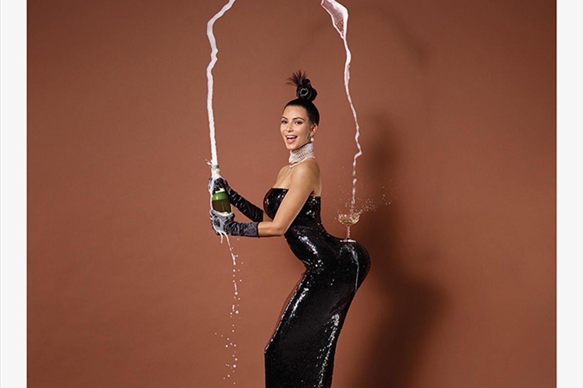kim kardashian champagne dress costume Kim Kardashian tries to recreate her iconic Champagne photo while nearly  bursting out of VERY tight red dress