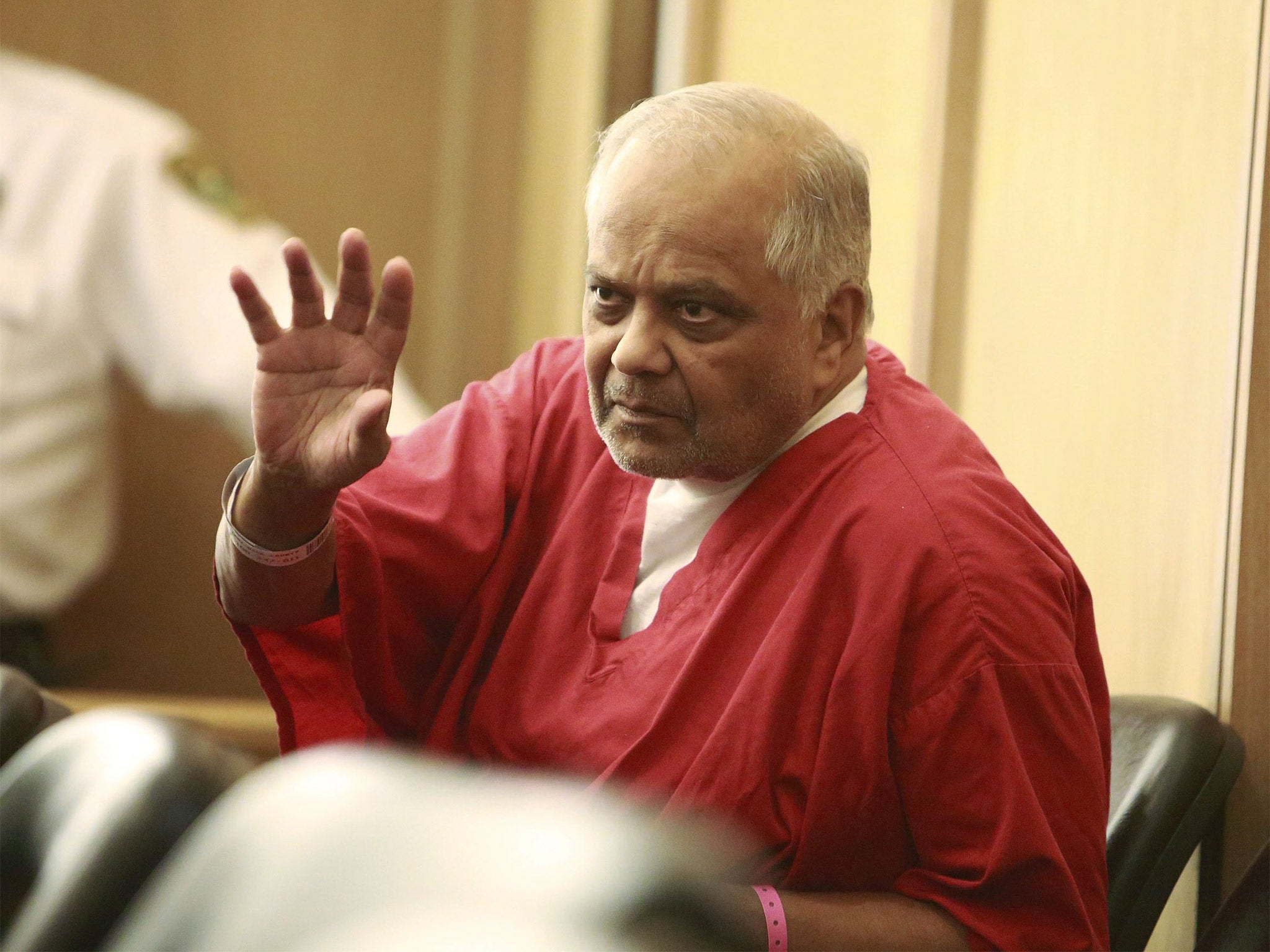 Krishna Maharaj, a Trinidadian former businessman who had a banana importing business, in court for the hearing in Miami