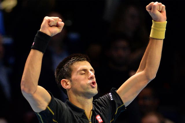 Novak Djokovic celebrates victory over Stanislas Wawrinka