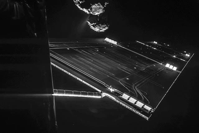 Image taken on 7 October 2014 by the CIVA camera on Rosetta's Philae lander from a distance of about 16 km from the surface of the comet. It captures the side of the Rosetta spacecraft and one of Rosetta's 14 m-long solar wings, with the comet in the back
