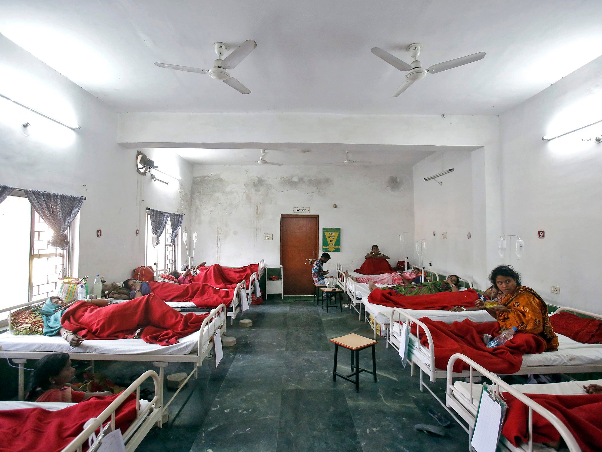 Women, who underwent a sterilization surgery at a government mass sterilisation "camp", lie in hospital beds for treatment at Chhattisgarh Institute of Medical Sciences (CIMS) hospital in Bilaspur, in the eastern Indian state of Chhattisgarh