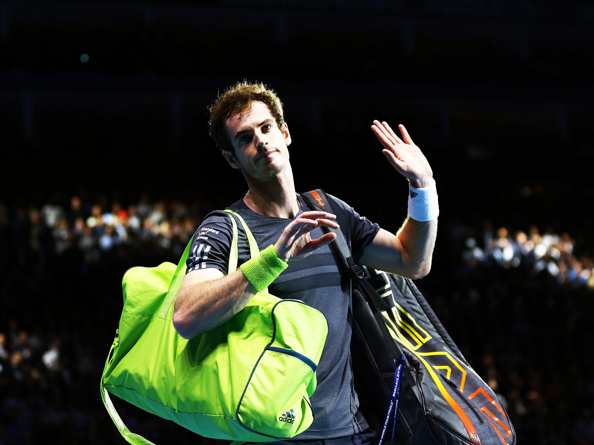A forlorn Andy Murray after being thrashed by Roger Federer at the 02 Arena
yesterday