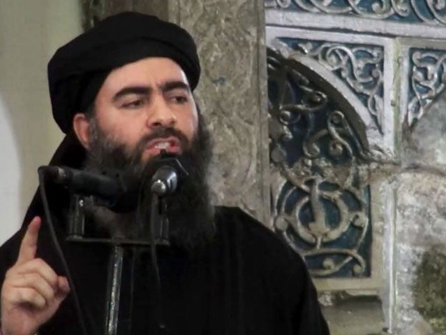 The leader of the Islamic State group, Abu Bakr al-Baghdadi, delivering a sermon at a mosque in Iraq.