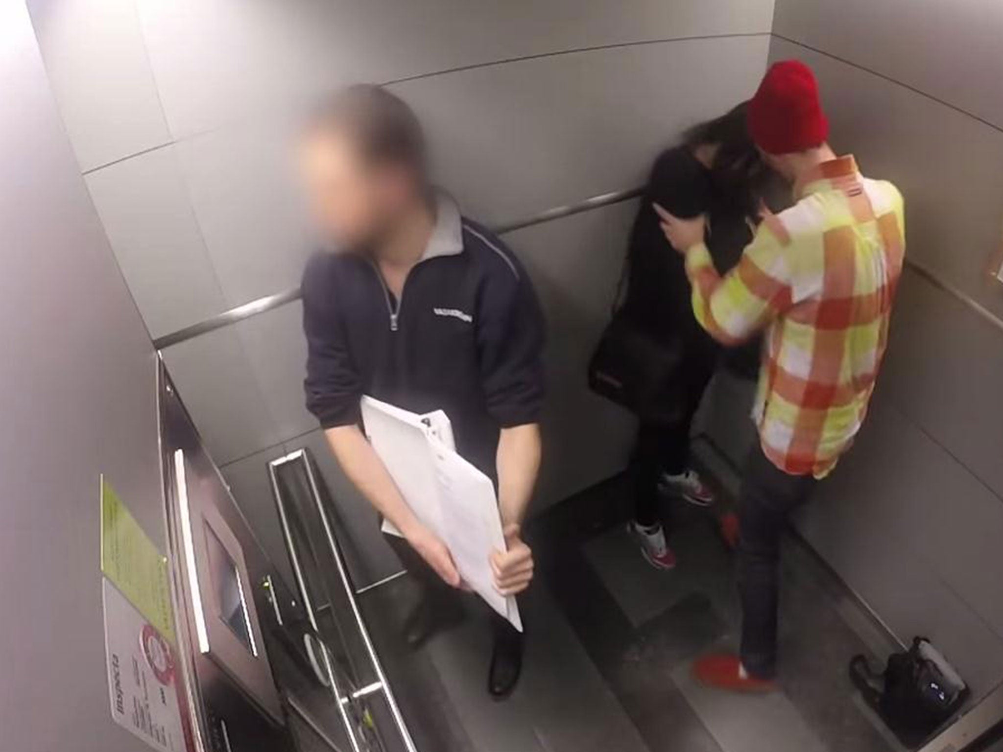 Two couples were filmed in a confrontation in the lift