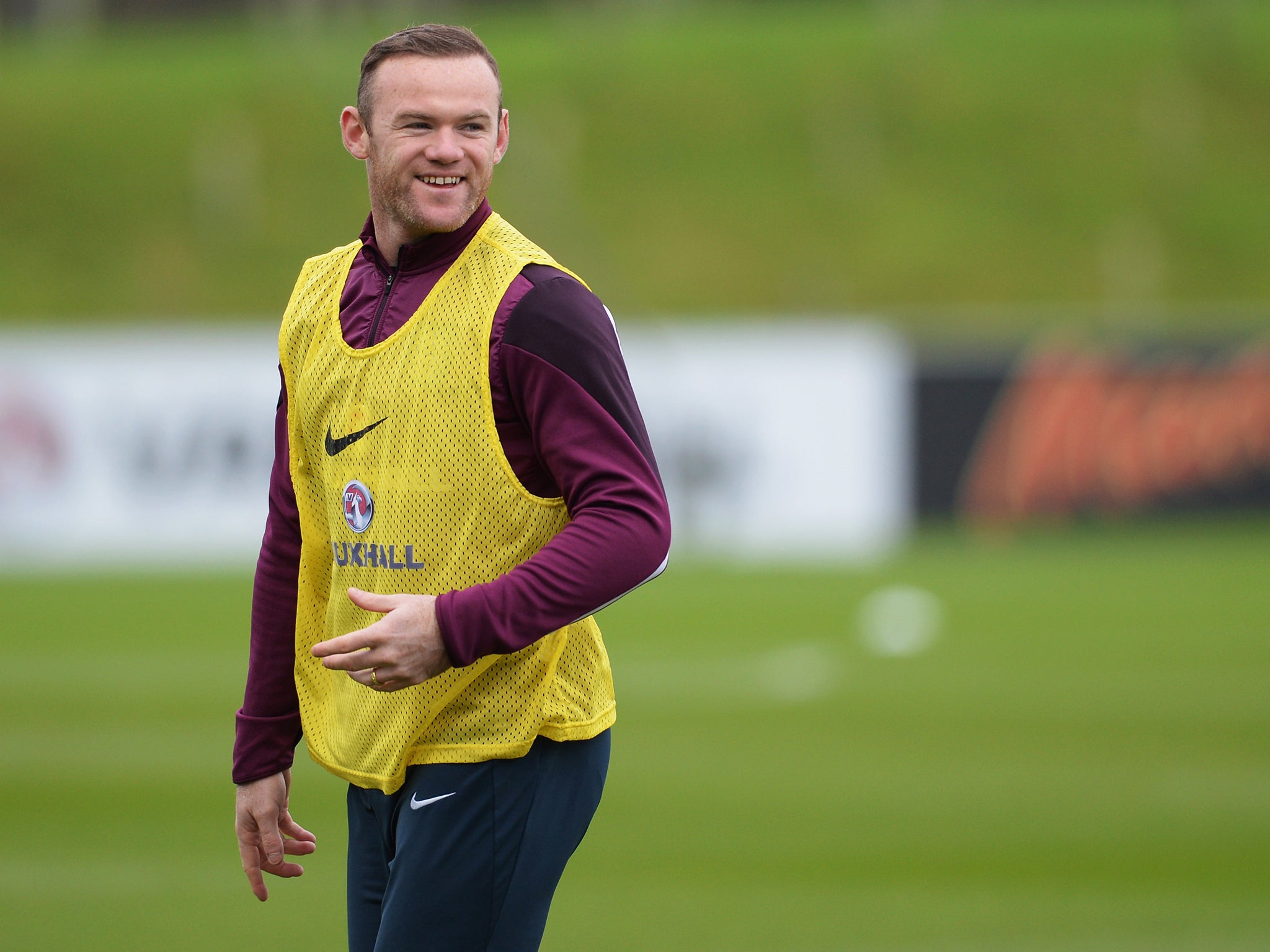 Wayne Rooney looks on during an England training session, ahead of the UEFA European Championship qualifier match against Slovenia, at St Georges Park on November 14, 2014 in Burton-upon-Trent, England.