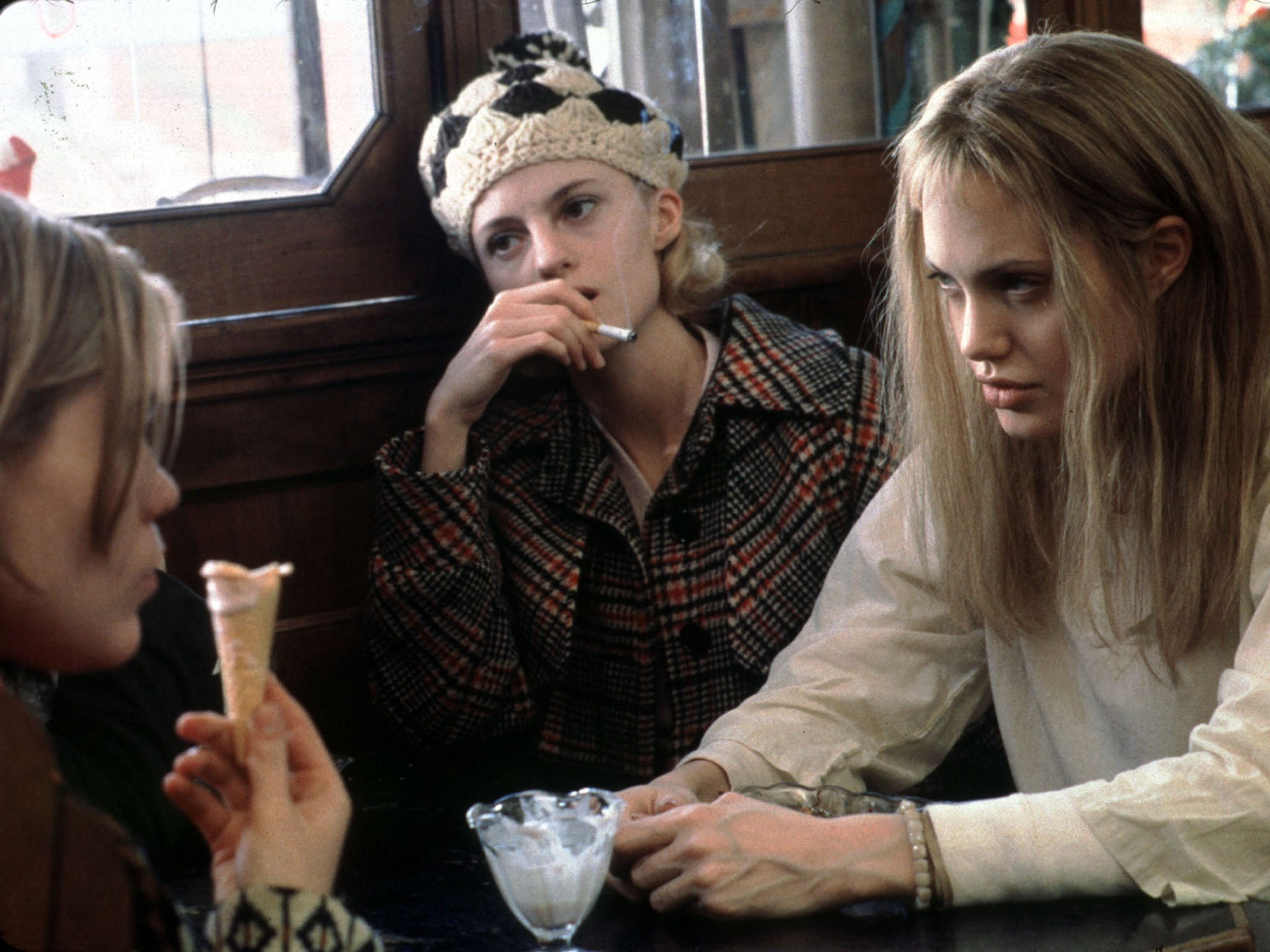 A scene from Girl Interrupted starring left to right Brittany Murphy as Daisy Elizabeth Moss as Polly and Angelina Jolie
