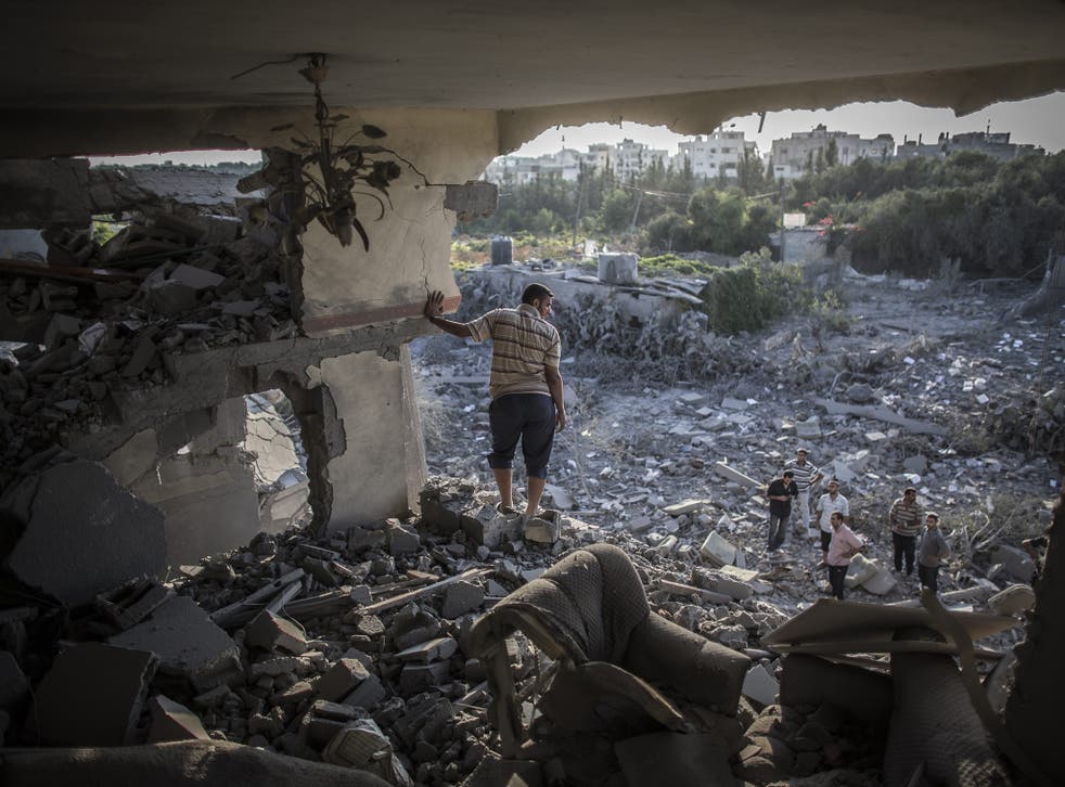 Palestinians saw their homes destroyed in Gaza City after it was shelled by Israeli forces in August