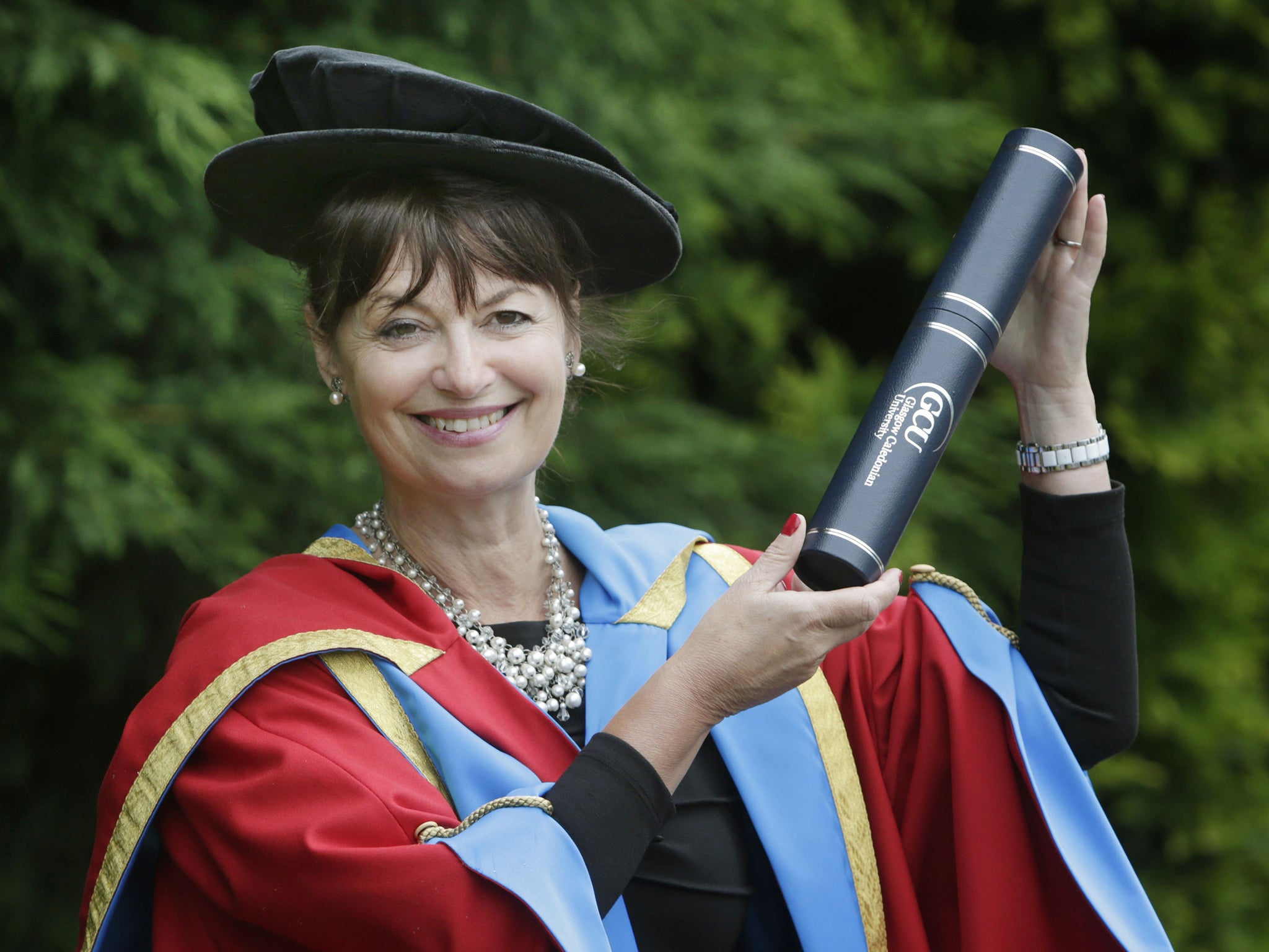 Professor Anne Glover, with her honorary degree from Caledonian University, said her EC
role had been difficult since day one