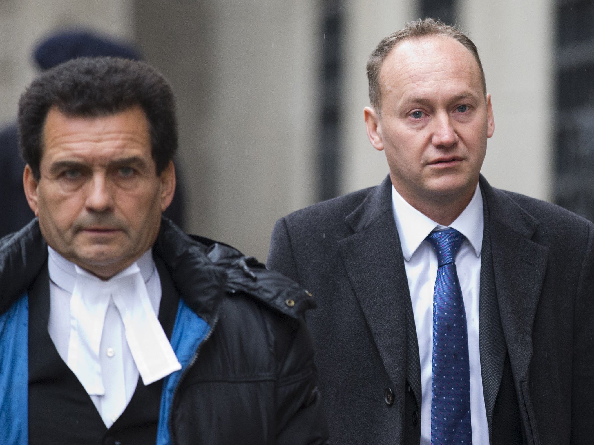 Gary Clarence (right) originally from South Africa arrives at the Old Bailey Central Criminal Court in London