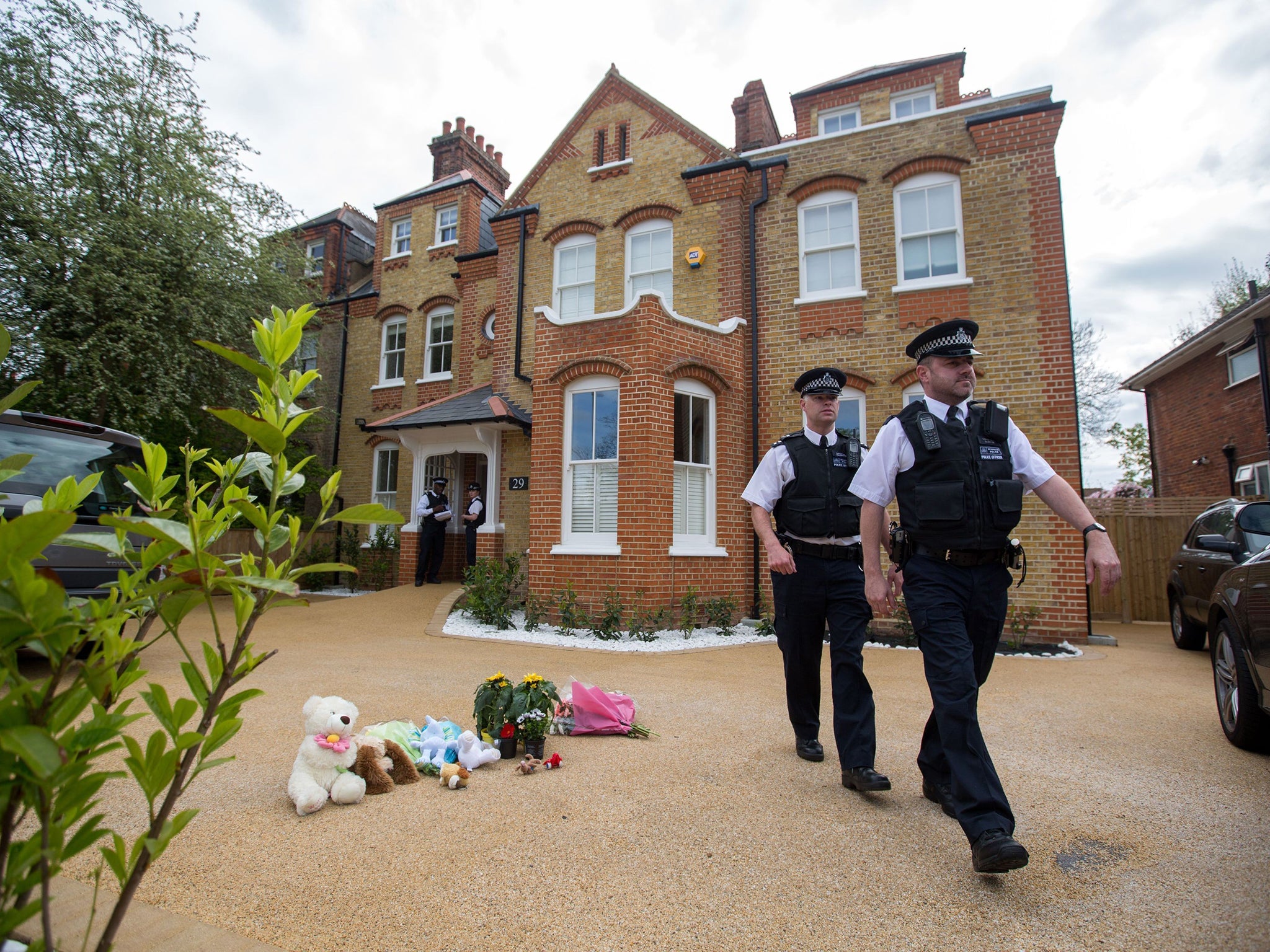 Tributes left outside the Clarence house in New Malden in south-west London