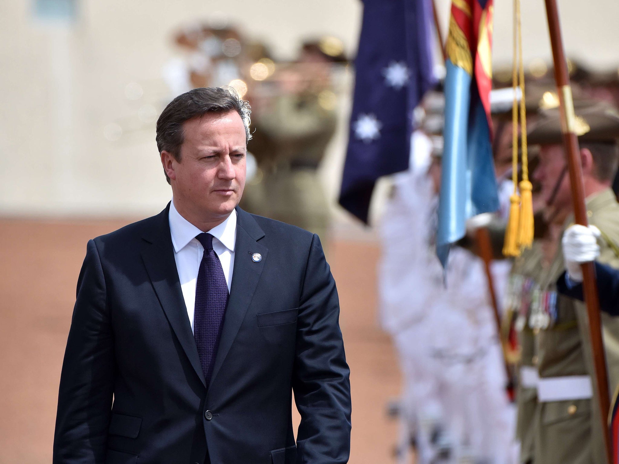 David Cameron inspects the Federation Guard in Canberra