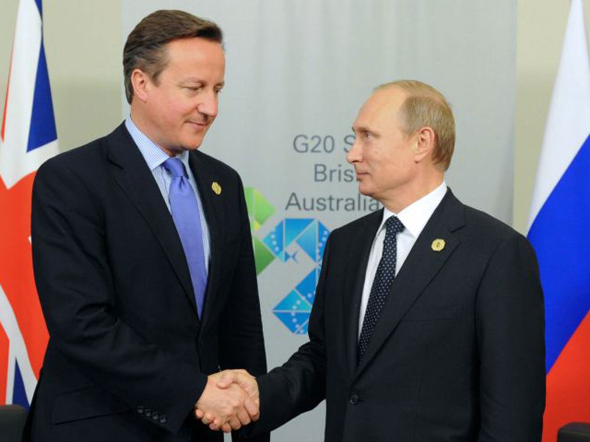 David Cameron and Vladimir Putin shake hands at the G20 in Brisbane