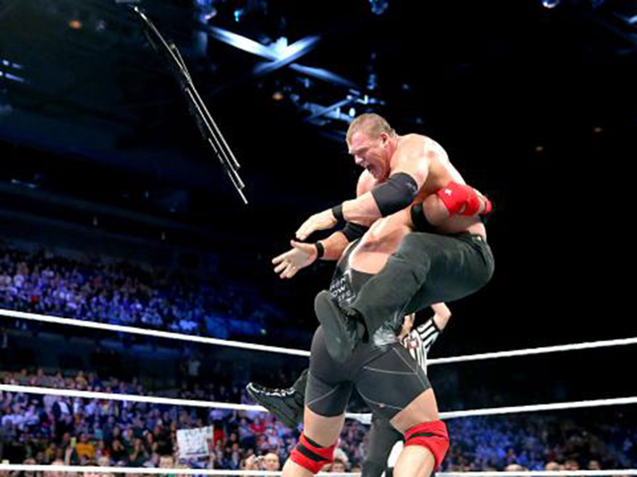 Ryback hits Kane with a spine-buster