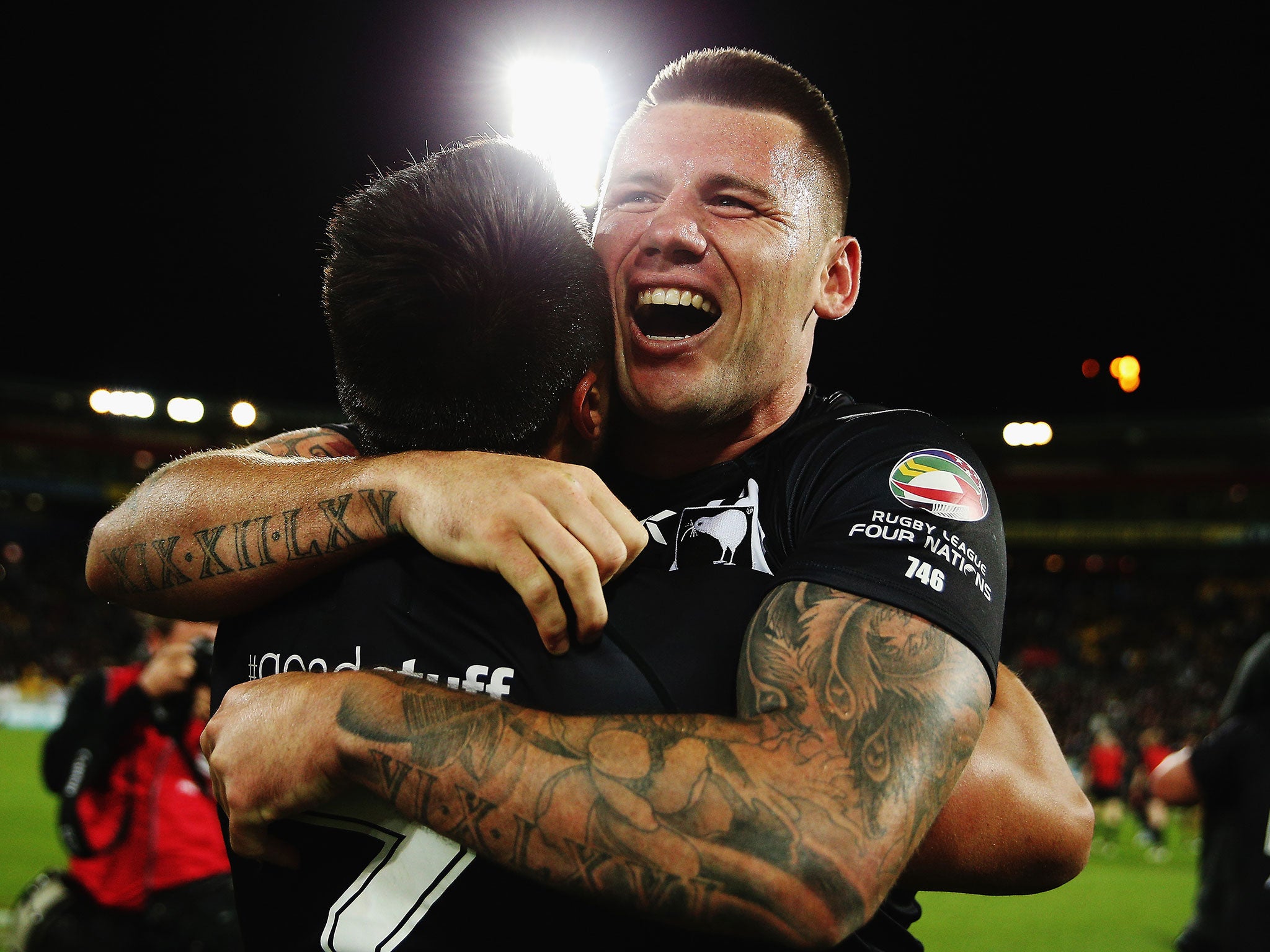 New Zealand's Shaun Johnson celebrates with Shaun Kenny-Dowall after they win the Four Nations title