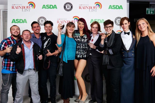 Cause to celebrate: Partygoers including Lewis Rimmer (second left), Fox Fisher (fourth left), Paris Lees (fifth from right) and CN Lester (third from right)