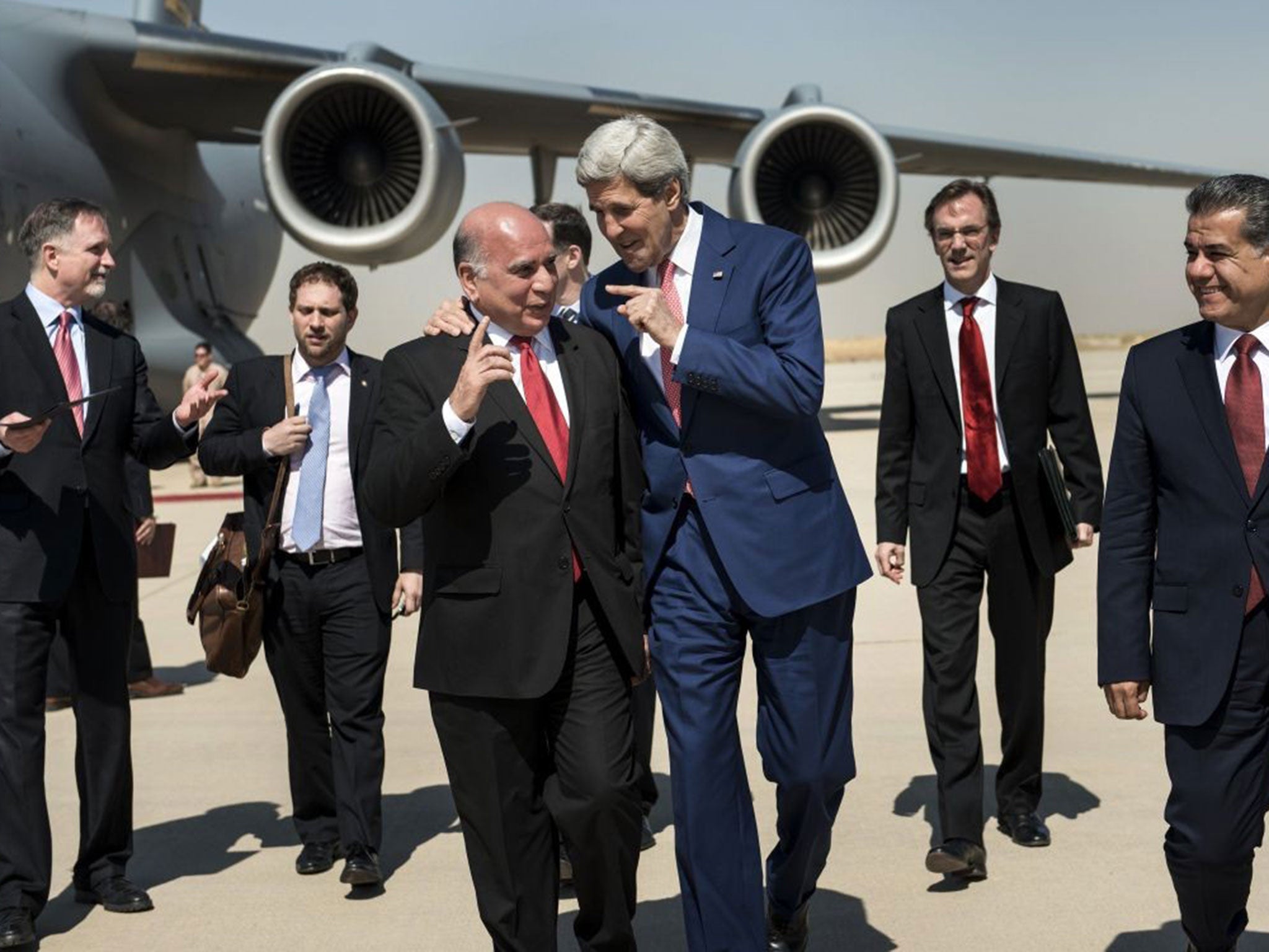 Holding on: Kurdish chief of staff Fuad Hussein with John Kerry in June AFP/Getty