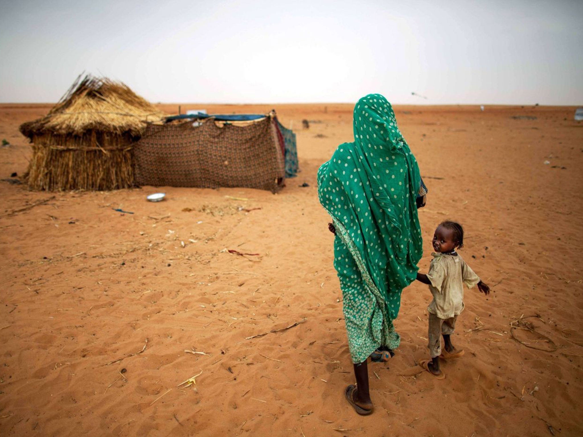 Victims of war: Women and children are still being targeted by opposition forces, despite the Darfur conflict officially ending eight years ago
