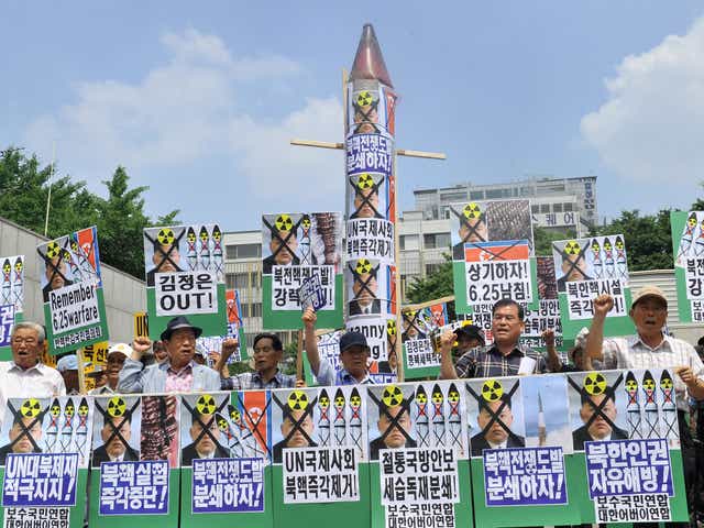 South Korean conservative activists demonstrate against North Korea's nuclear programs in Seoul in 2013.
