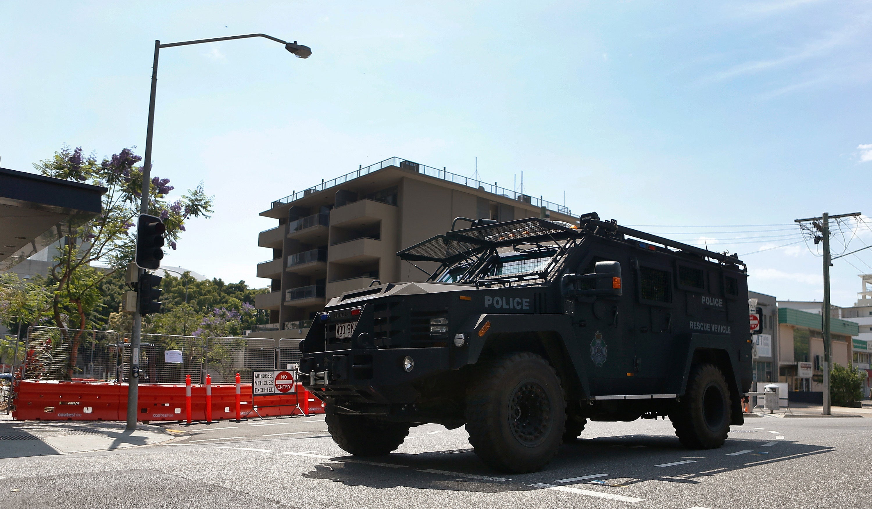 An armoured police vehicle patrols near the Brisbane Convention and Exhibition Centre on November 16, 2014 in Brisbane, Australia