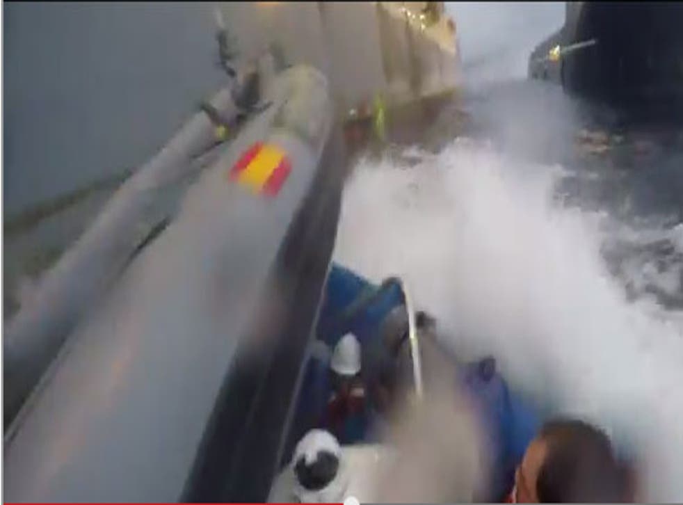 The moment the Greenpeace dinghy is rammed by a Spanish naval vessel
