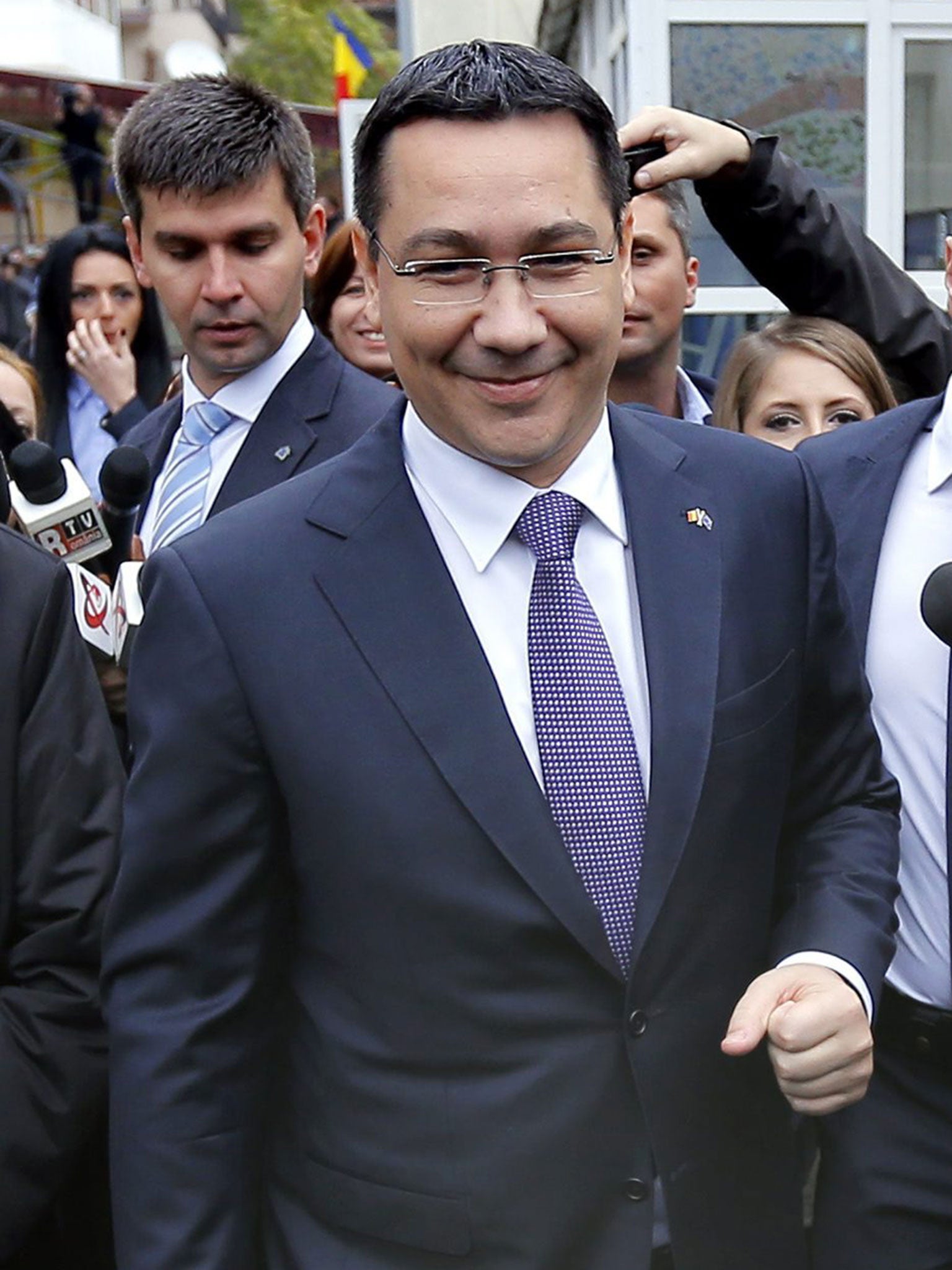 Victor Ponta, 42 and a former amateur rally driver, says he will cut taxes and raise penions