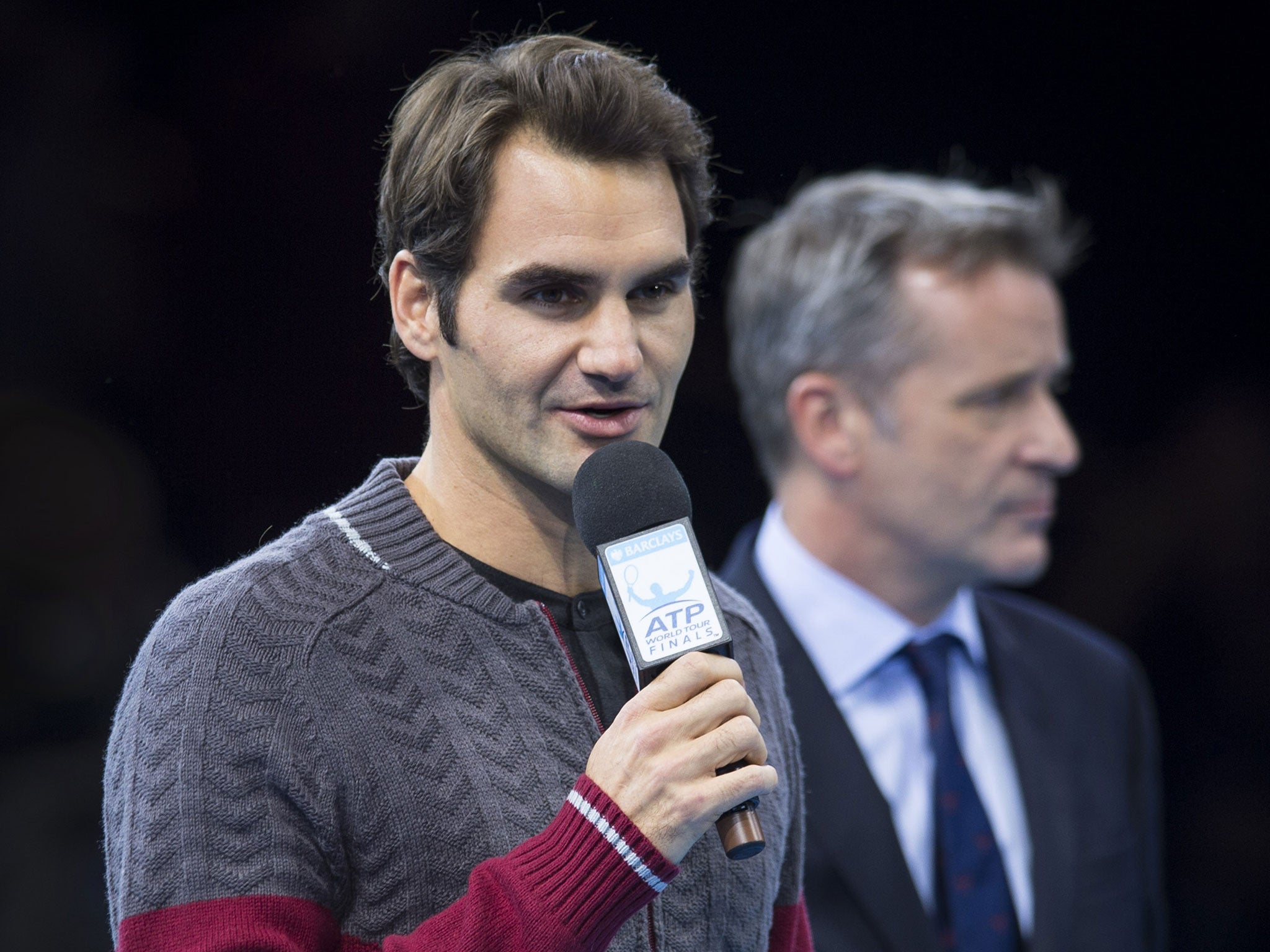 Roger Federer makes his apologies to the O2 crowd for missing the final