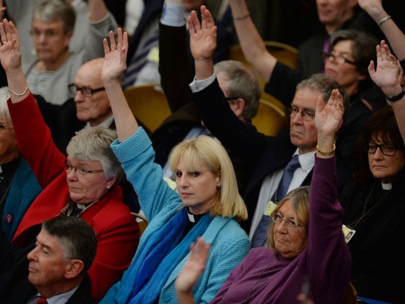 Clergy cast votes in favour of women Bishops at the Anglican General Synod in Church House, London, allowing women to become bishops for the first time.