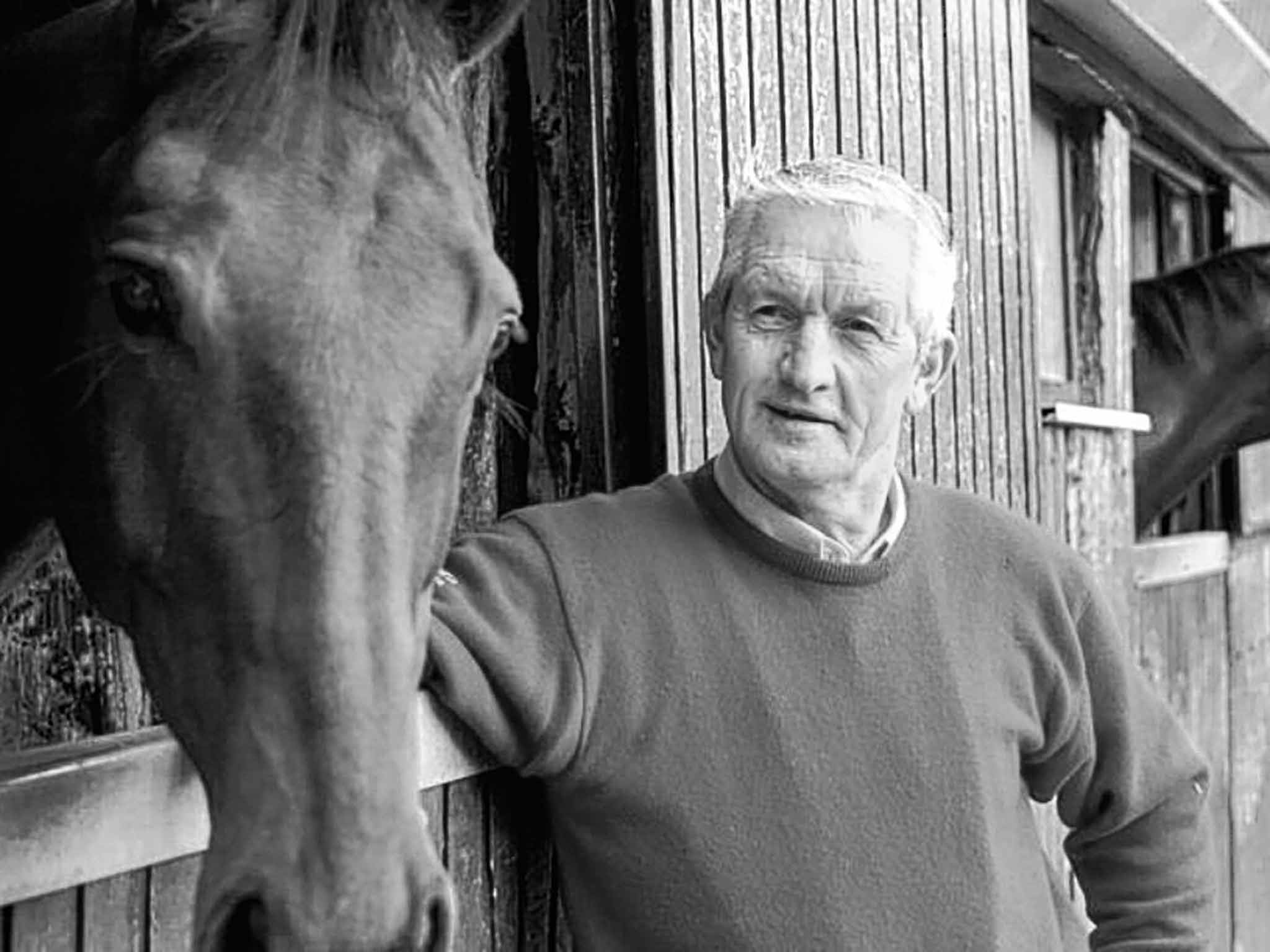 Hughes in 2005 at his stables with Hardy Eustace, the best horse he trained