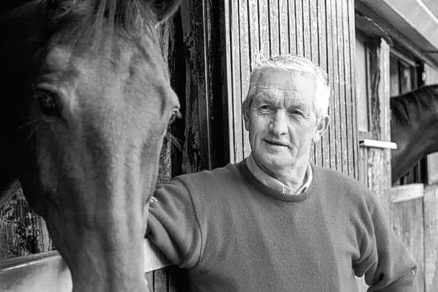 Hughes in 2005 at his stables with Hardy Eustace, the best horse he trained
