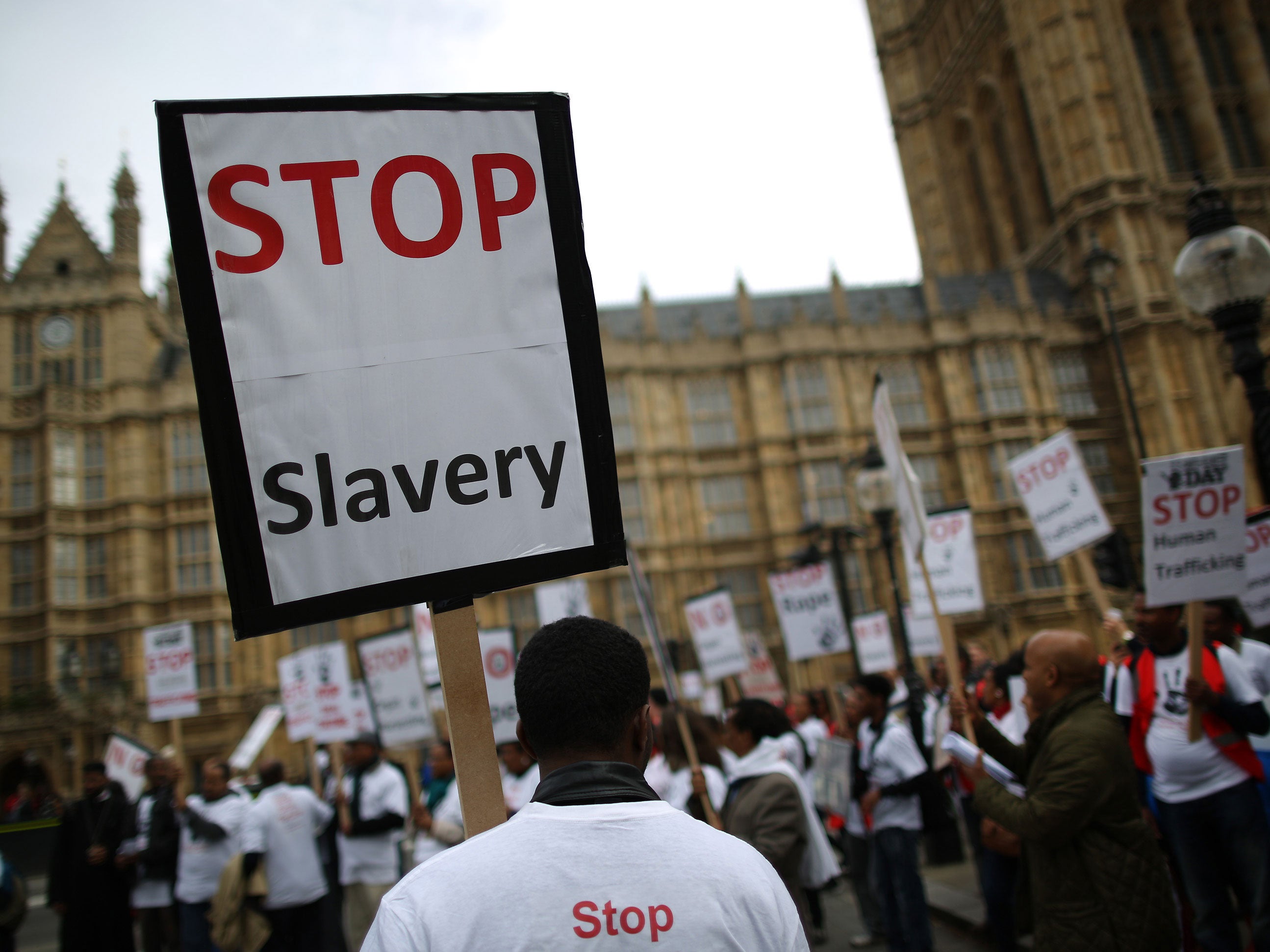Anti-slavery activists rally outside Parliament 