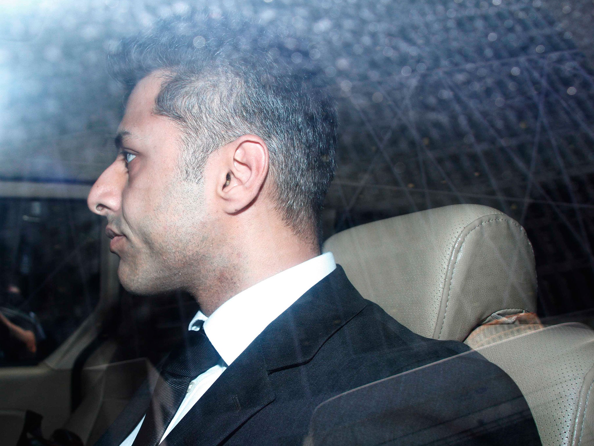 Shrien Dewani leaves the Western Cape High Court in South Africa