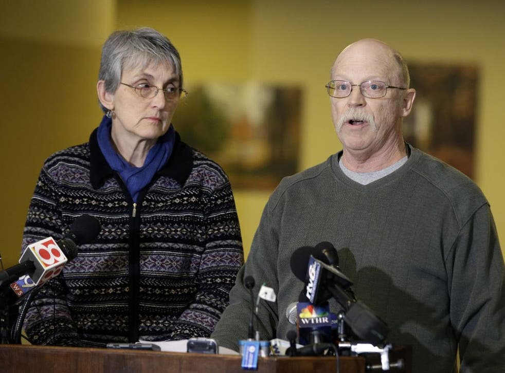 Ed and Paula Kassig, parents of Peter Kassig, speak during a news conference