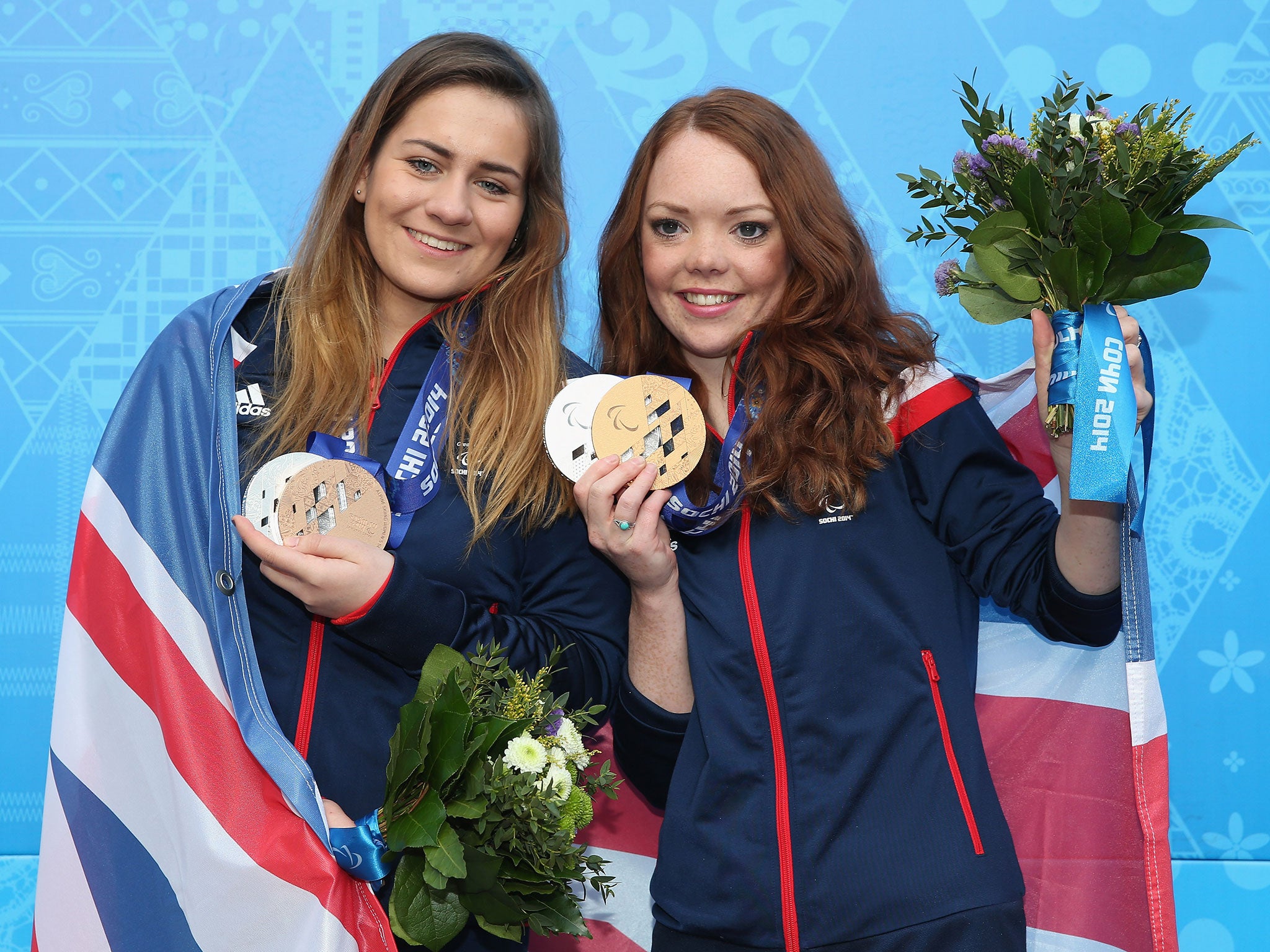 Jade Etherington and guide Caroline Powell celebrates winning bronze in the Women's Super-G - Visually Impaired