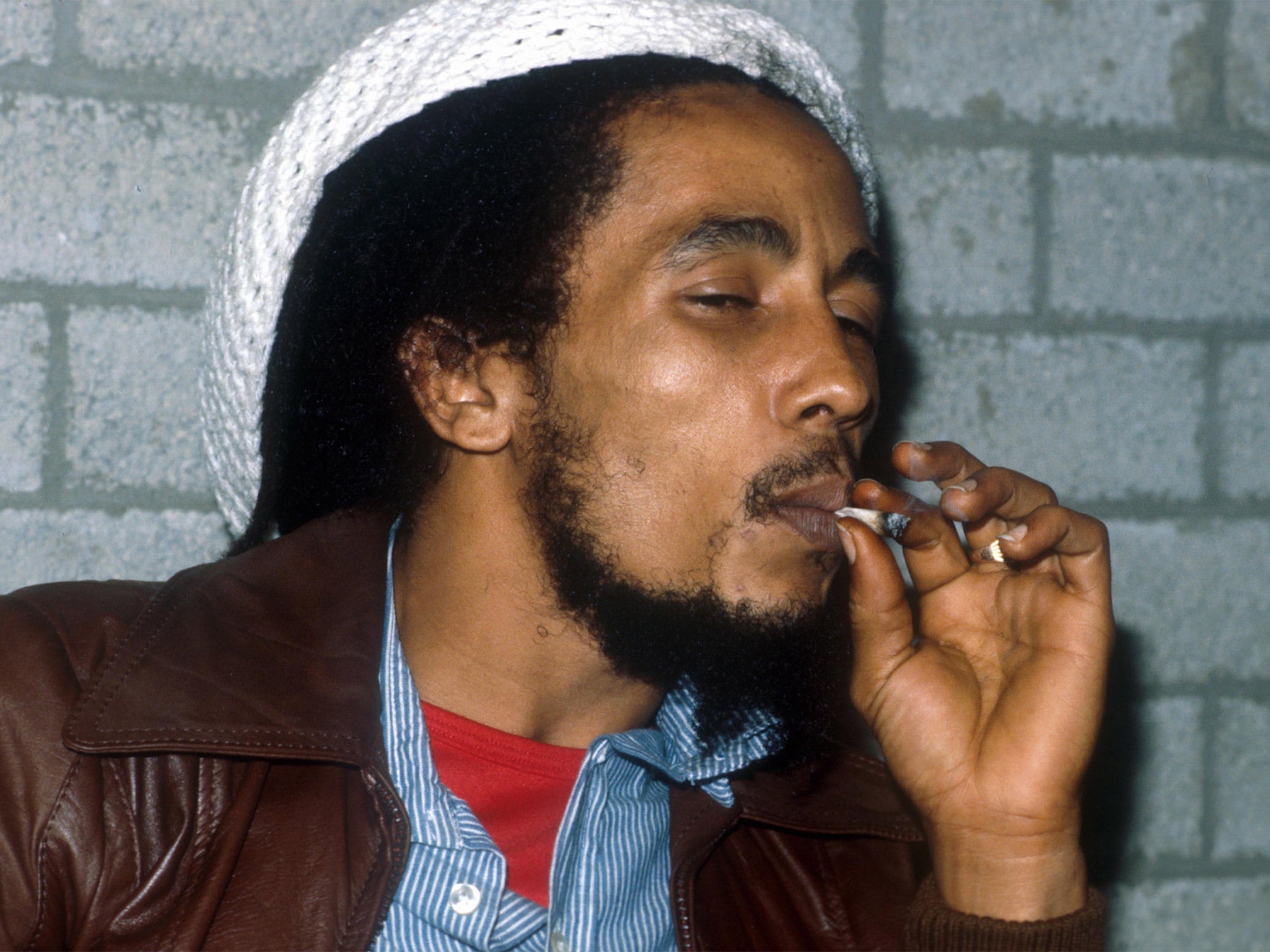 Bob Marley smoking a joint backstage before a gig in Rotterdam