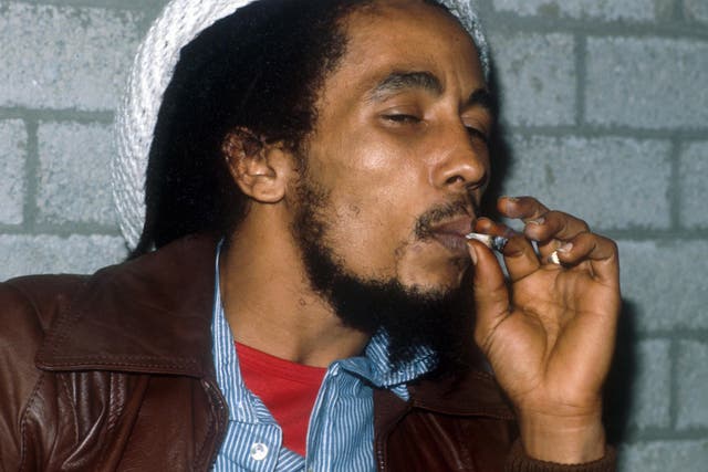 Bob Marley smoking a joint backstage before a gig in Rotterdam