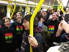 Choir stages mass singalong on tram in solidarity with victims of homophobic attack