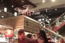 TGI Friday drone crashes into woman's face and cuts it open in restaurant