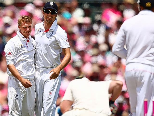 Scott Borthwick (left) celebrates with the England captain, Alastair Cook, after dismissing Brad Haddin in the final Ashes Test in Sydney in January. He took four wickets on his debut