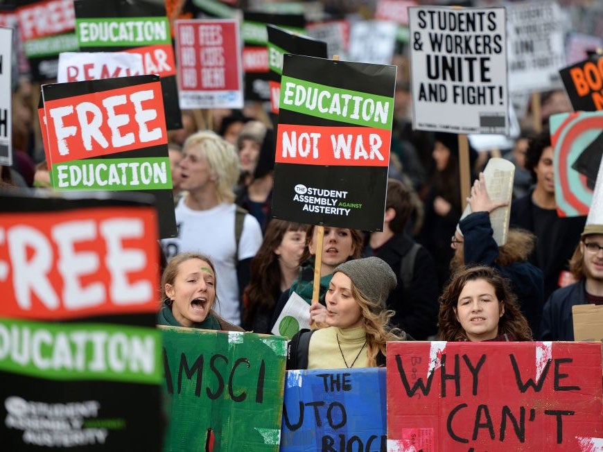 Thousands of students march through central London calling for an end to tuition fees and student cuts during a national protest in London