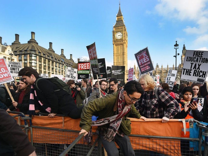 Thousands of students storm Parliament Square in central London (PA)