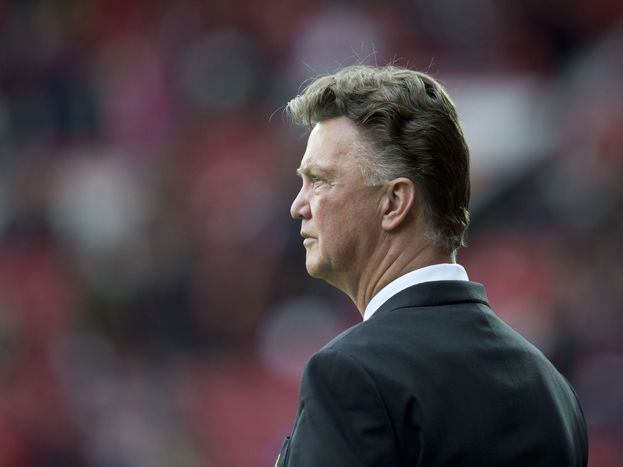 Louis van Gaal looks on from the touchline