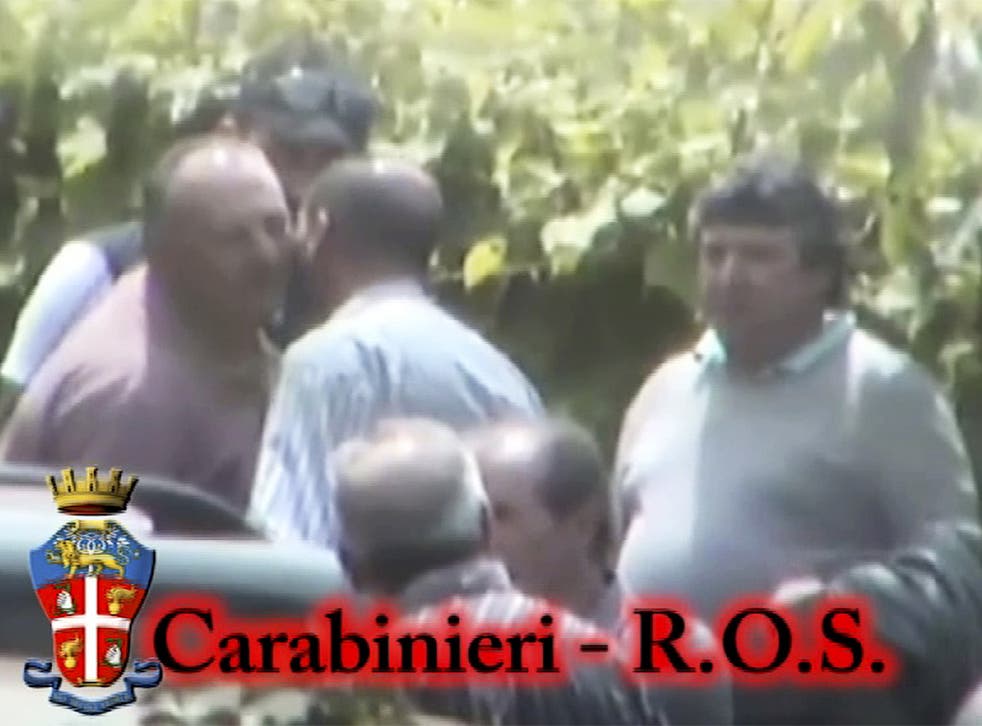 Video provided by the Italian Carabinieri (paramilitary police) shows people identified as Italian crime syndicate Ndrangheta members kissing each other