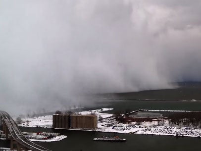 A storm rolls across a lake in Buffalo