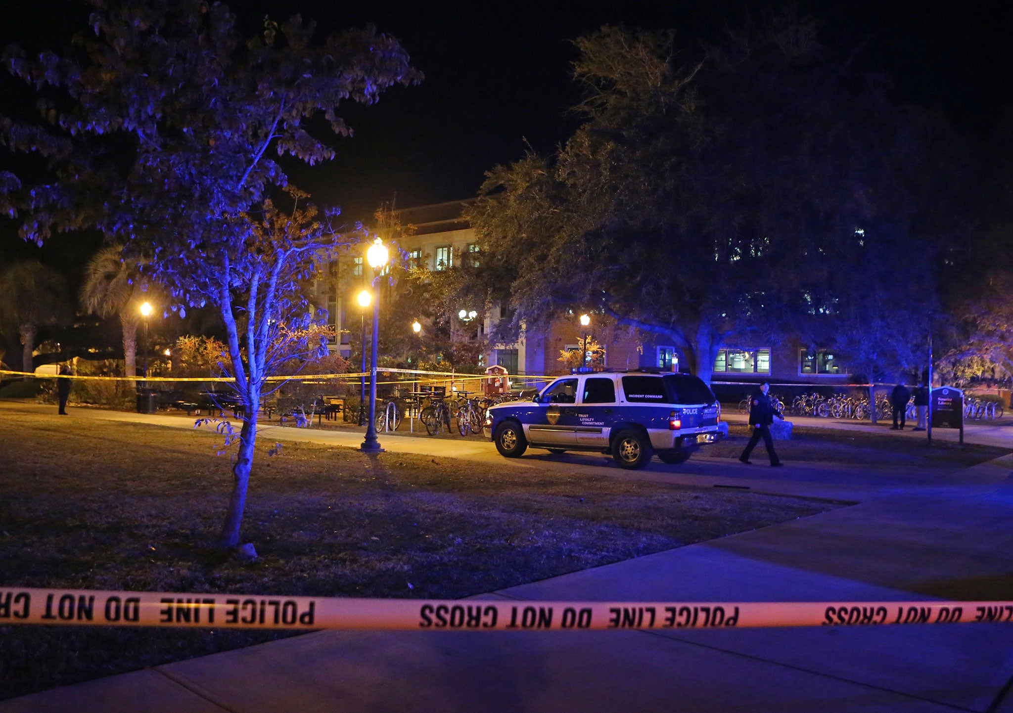 Police investigate a shooting at Strozier Library on Florida State campus on Thursday, Nov. 20, 2014, in Tallahassee, Fla